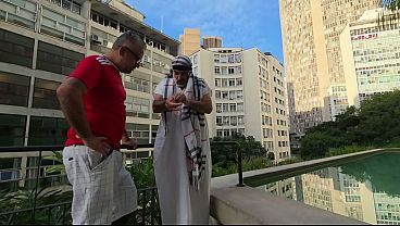 Arab sheikh and guide in an explicit hotel scene during World Cup period